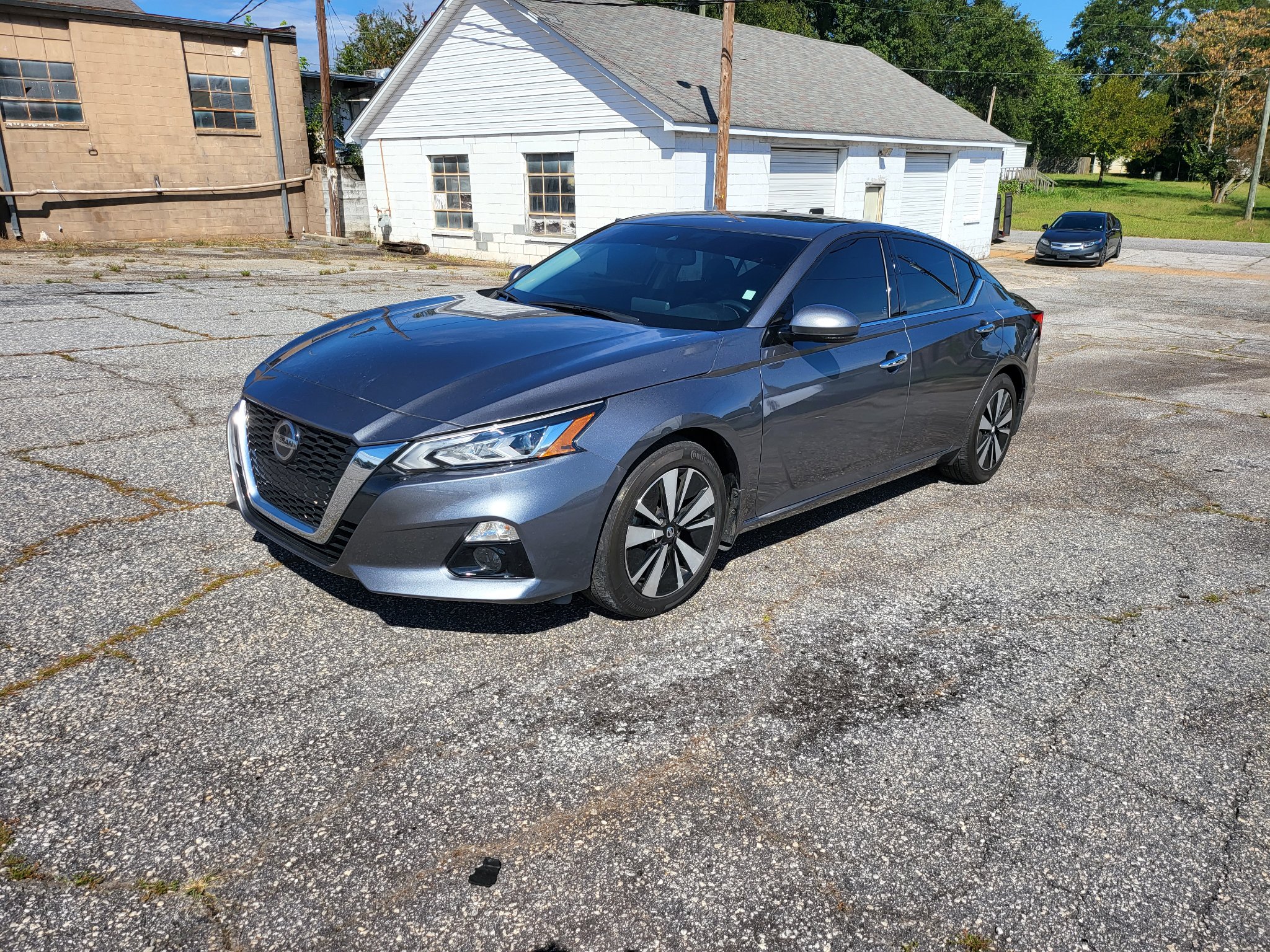 Nissan Altima after side repair and refinish