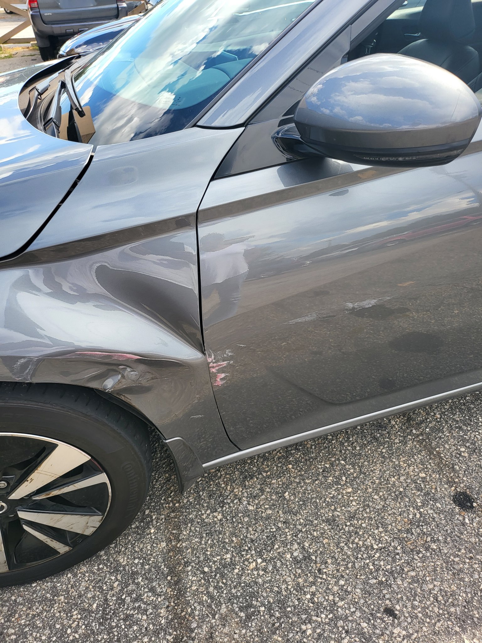 Nissan Altima side damage before repair
