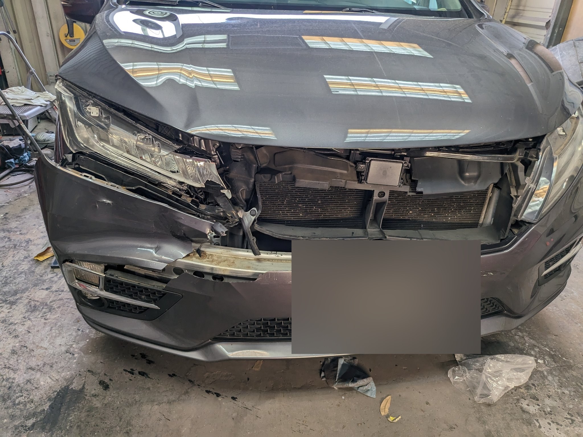 Honda Odyssey front-end damage before repair
