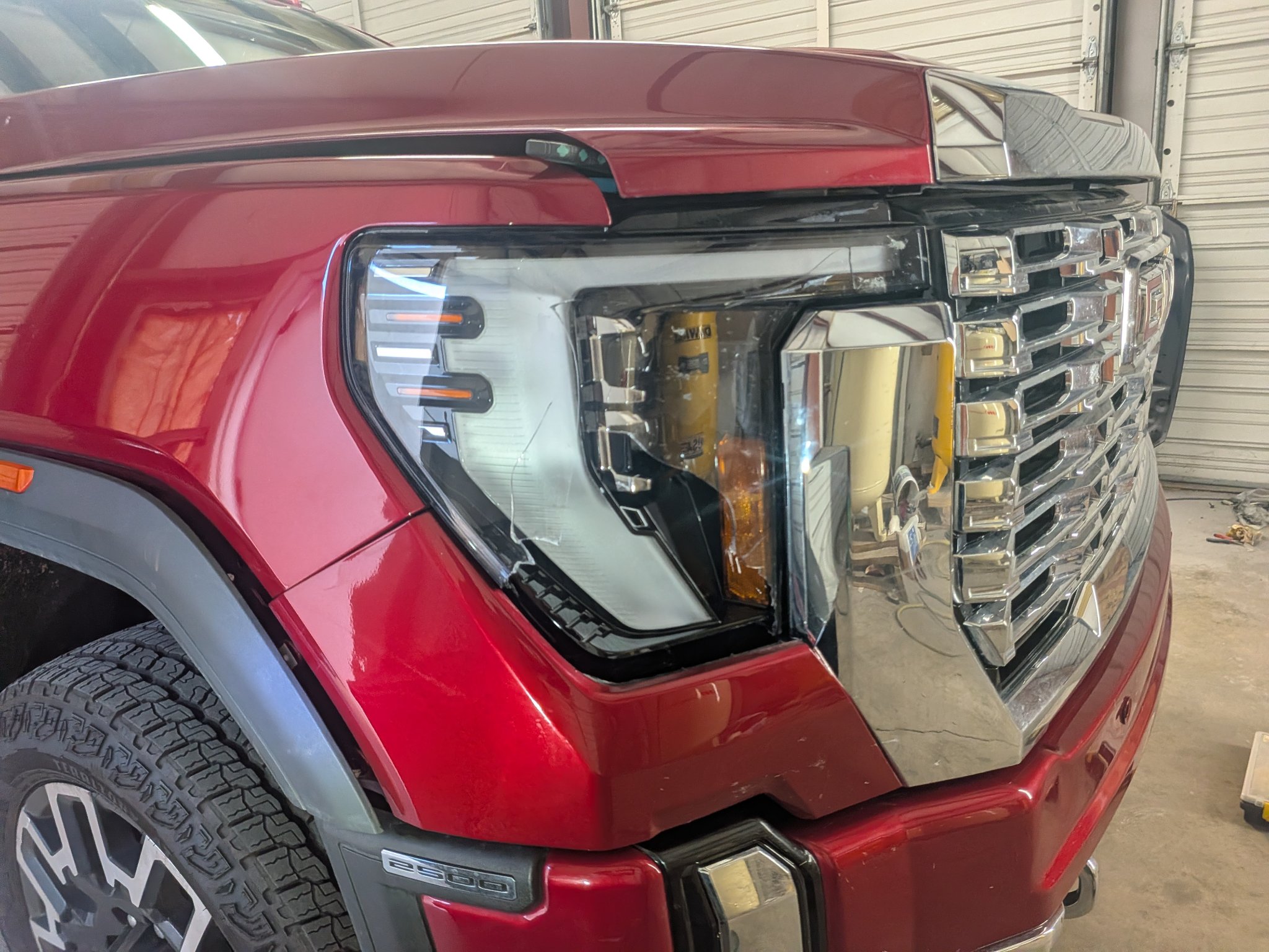 GMC Sierra Denali front-end damage before repair